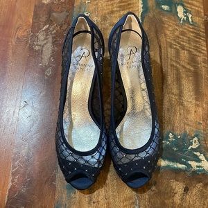 Short heels. Navy Blue, mesh sequin sides and toe. Women’s Size 7.5.